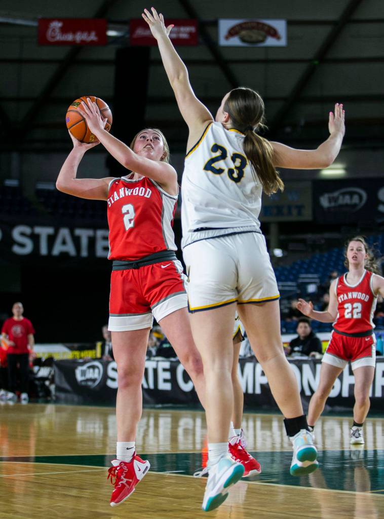 Stanwoods Ellalee Wortham tries to make a jump shot while being guarded during the 3A quarterfinal game against Mead on Thursday, March 2, 2023 in Tacoma, Washington. (Olivia Vanni / The Herald)