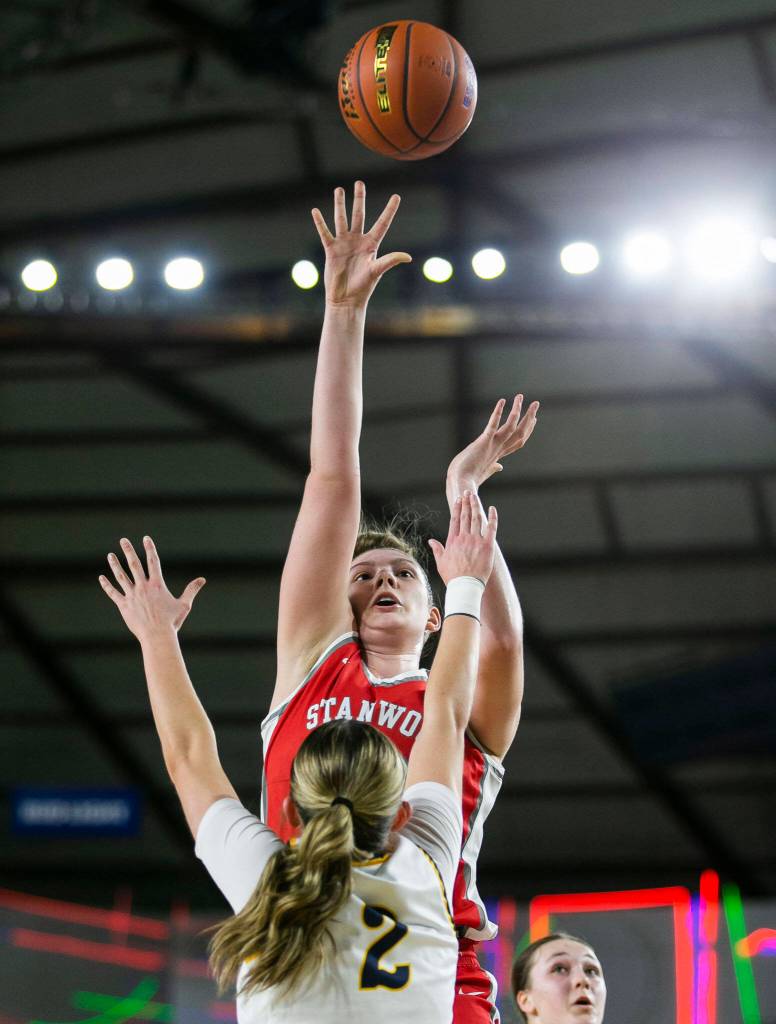 Stanwoods Vivienne Berrett makes a jump shot during the 3A quarterfinal game against Mead on Thursday, March 2, 2023 in Tacoma, Washington. (Olivia Vanni / The Herald)