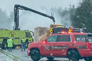 Firefighters worked to extinguish a blaze on a semi-truck's haul of hay Thursday morning along northbound Interstate 5 just south of Highway 526. (Washington State Patrol)