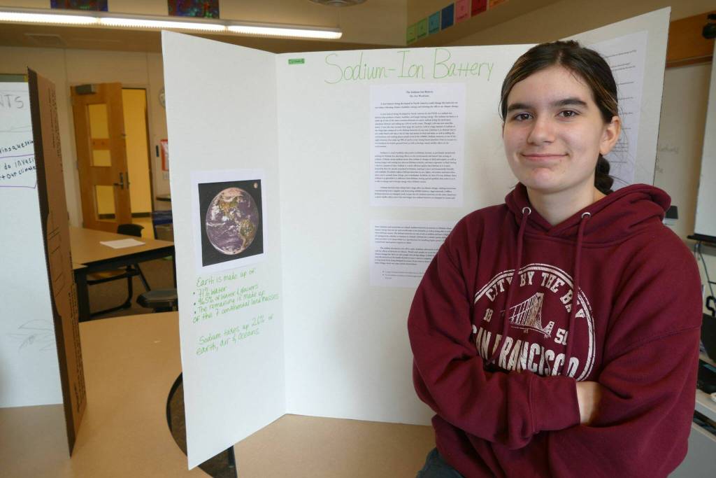 Maplewood Parent Cooperative seventh grader Ava Woodsum researched sodium-ion batteries as her climate class project Feb. 22 in Edmonds. (Julie Titone / The Herald)