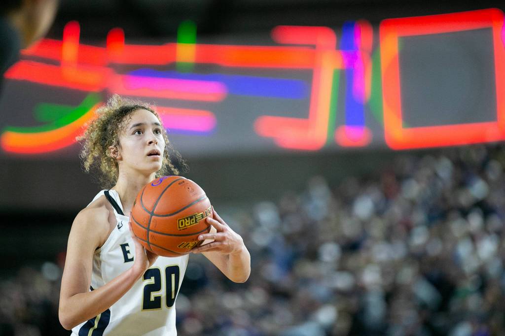 Arlingtons Samara Morrow takes a free throw against Lake Washington in the 3A semifinal on Friday, March 3, 2023, at the Tacoma Dome in Tacoma, Washington. Arlington shot 16 for 23 from the line. (Ryan Berry / The Herald)