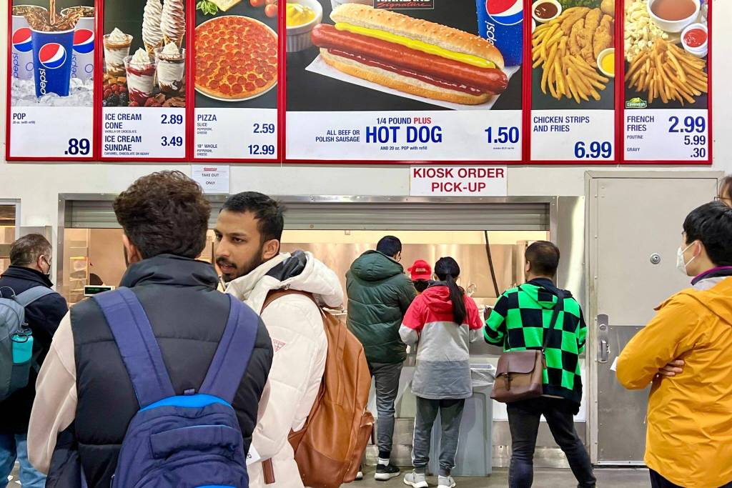 Poutine french fries with cheese curds and gravy are in the menu at the Costco food court in Vancouver, B.C. (Andrea Brown / The Herald)