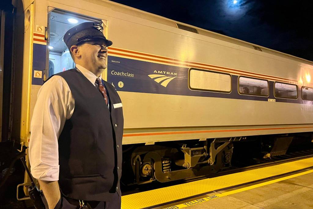 Amtrak conductor Dereck Johnson at the Stanwood train station. (Andrea Brown / The Herald)
