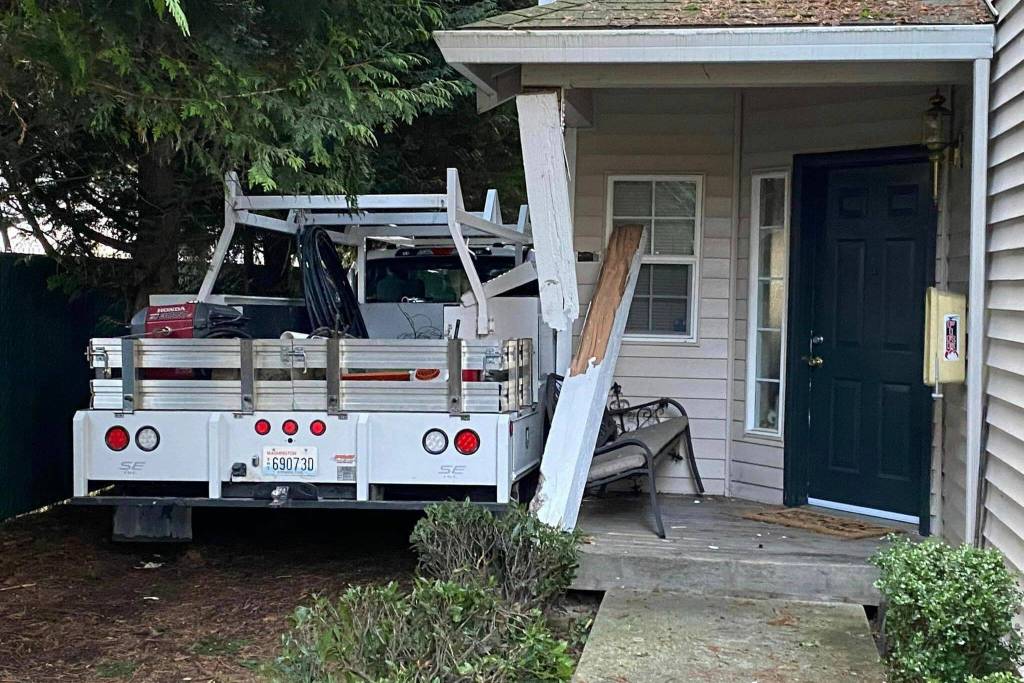 The stolen City of Stanwood work truck that crashed into Carrolls Creek Landing on Monday, March 6, 2023, in Marysville, Washington. The vehicle struck a gas meter which caused four housing buildings to evacuate.(Snohomish Country Sheriffs Office)