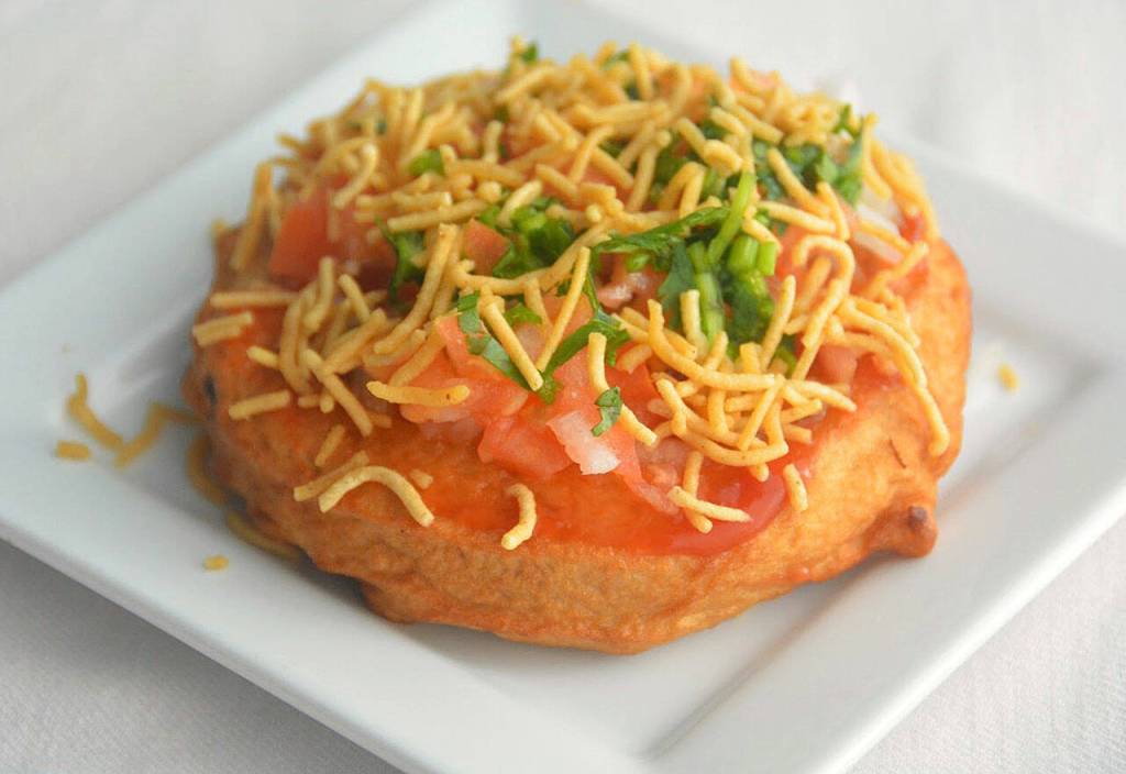 Make a gold coin for St. Patrick’s Day. It’s bread cut into the shape of a coin, stuffed with mashed potatoes, battered and fried. (Reshma Seetharam)