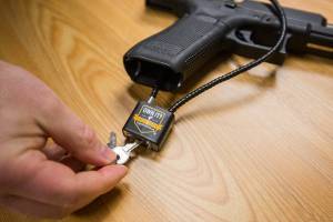 A Project Child Safe gun lock that is available at the Everett Police Department on Thursday, March 12, 2020 in Everett, Wa. (Olivia Vanni / The Herald)