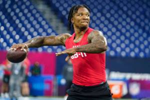 Florida quarterback Anthony Richardson runs a drill at the NFL football scouting combine in Indianapolis, Saturday, March 4, 2023. (AP Photo/Darron Cummings)