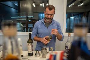 Ryan Hembre prepares a Spring Wish cocktail at Skip Rock Distillery on March 3, 2023 in Snohomish, Washington. Owners Ryan and Julie Hembre recently opened their new remodeled space and will be serving cocktails with their own spirits for the first time. (Annie Barker / The Herald)