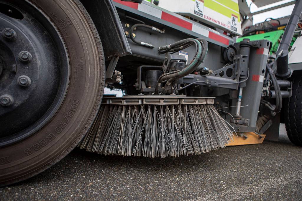 The battery powered sweepers create zero-emissions while operating, as demonstrated Friday at Paine Field Airport in Everett. (Annie Barker / The Herald)