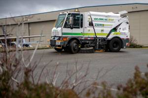 An all-electric street sweeper is displayed at Paine Field in Everett, Washington, on Friday, March 10, 2023. (Annie Barker / The Herald)