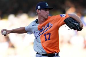 American League relief pitcher Emerson Hancock throws to a National League batter during the MLB All-Star Futures baseball game, Saturday, July 16, 2022, in Los Angeles. (AP Photo/Abbie Parr)
