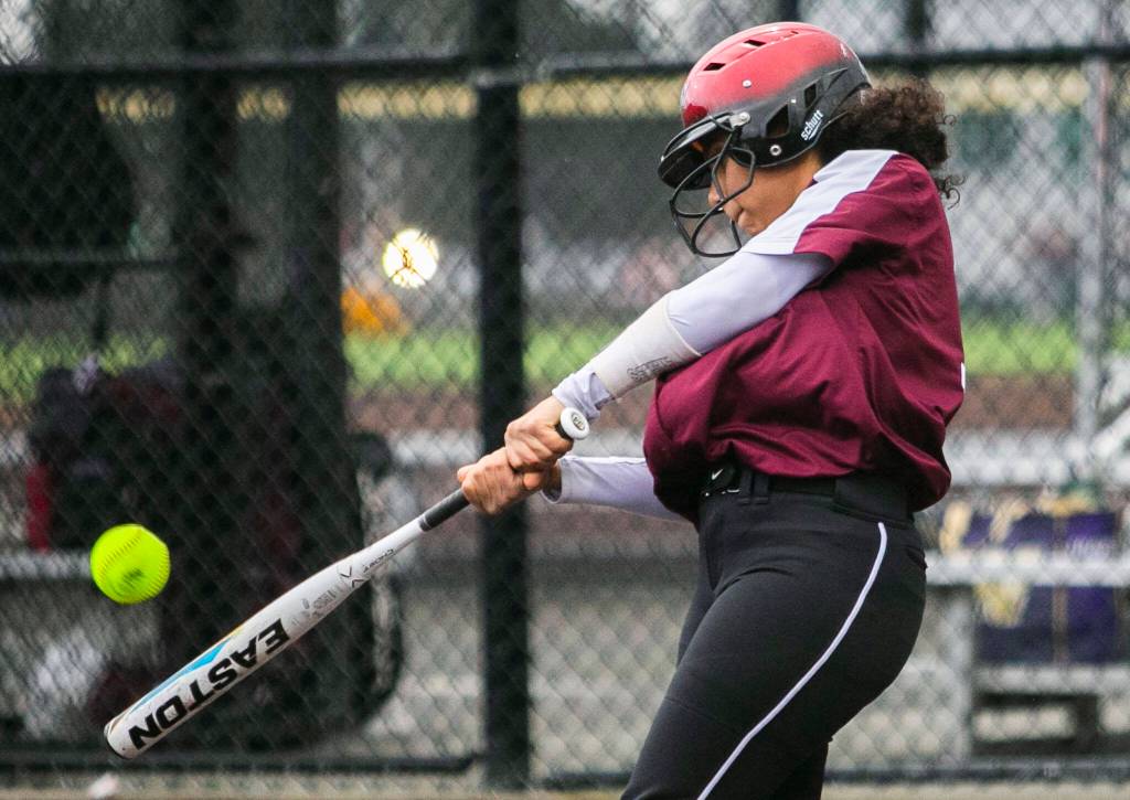 Cascades Jaidyn Wilson gets a hit during the game against Lakewood on Monday, March 13, 2023 in Everett, Washington. (Olivia Vanni / The Herald)