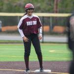 Cascades Jaidyn Wilson laughs after hitting a double during the game against Lakewood on Monday, March 13, 2023 in Everett, Washington. (Olivia Vanni / The Herald)