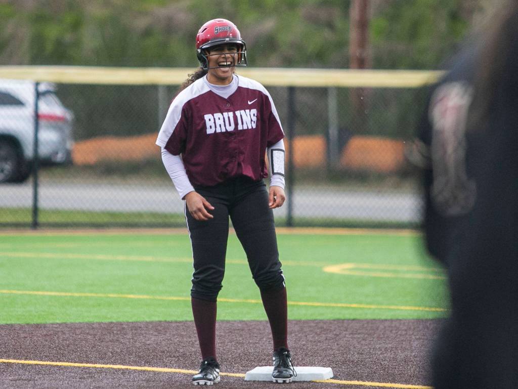 Cascades Jaidyn Wilson laughs after hitting a double during the game against Lakewood on Monday, March 13, 2023 in Everett, Washington. (Olivia Vanni / The Herald)