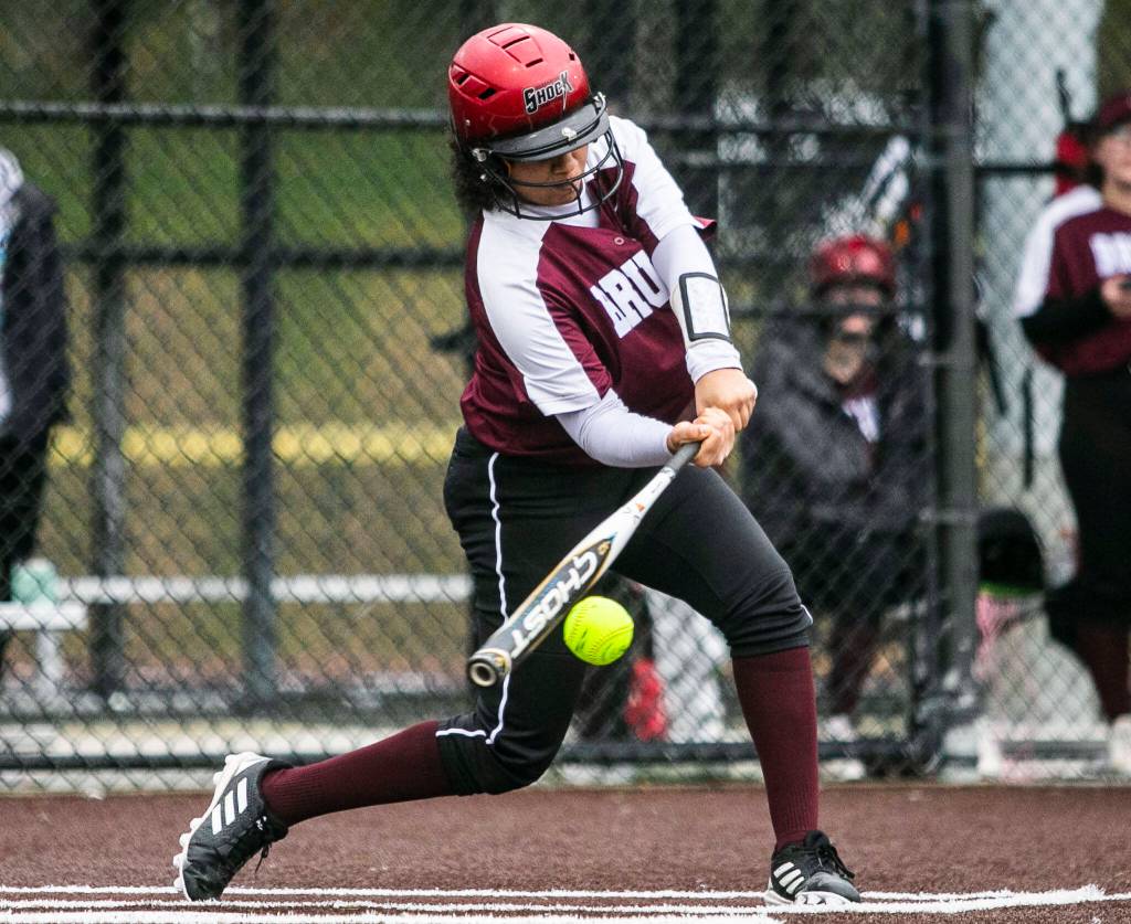 Cascades Jaidyn Wilson gets a hit during the game against Lakewood on Monday, March 13, 2023 in Everett, Washington. (Olivia Vanni / The Herald)