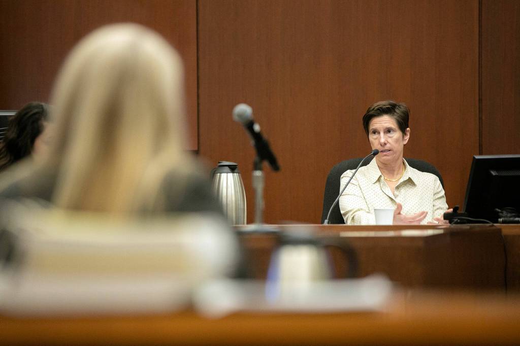 Dr. Wendi Wachsmuth, a clinical psychologist, answers questions from the defense during the trial of Richard Rotter on Thursday, March 30, 2023, at Snohomish County Superior Court in Everett, Washington. (Ryan Berry / The Herald)