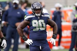 Seattle Seahawks defensive tackle Jarran Reed looks on against the New York Giants during an NFL football game, Sunday, Dec. 6, 2020, in Seattle. (AP Photo/Larry Maurer)