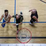 Nome McCaffrey, 57, left, moves with the ball during a pick-up basketball game at the Marysville YMCA in Marysville, Washington, on Monday, March 13, 2023. (Annie Barker / The Herald)