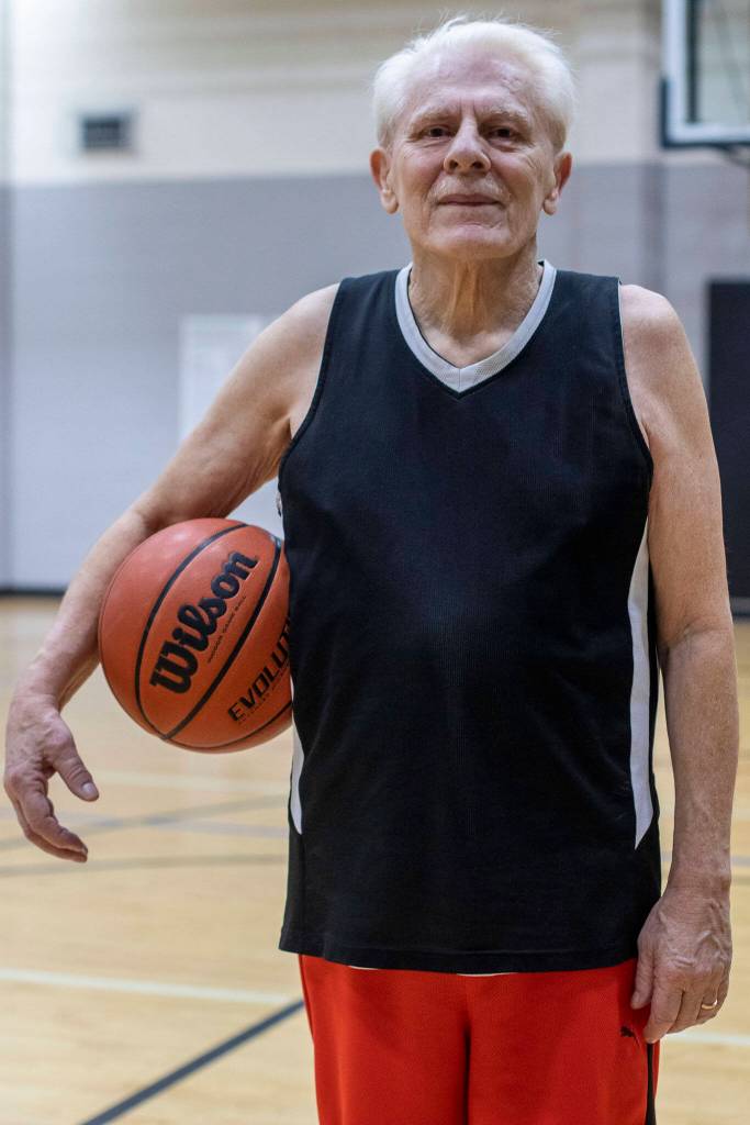 Sal Fonceca, 74, poses for a photo after one of their regular pick-up game of basketball at the Marysville YMCA in Marysville, Washington on Monday, March 13, 2023. (Annie Barker / The Herald)