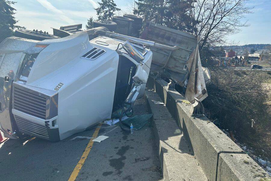 The on ramp to N5 from SR2 is fully blocked from a one semi rollover minor injury collision on Thursday, March 16, 2023, in Everett, Washington. (Photo provided by Trooper Kelsey Hardin)