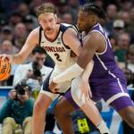 Gonzaga forward Drew Timme (left) backs down Grand Canyon forward Yvan Ouedraogo during a first-round mens NCAA Tournament game on Friday in Denver. (AP Photo/David Zalubowski)