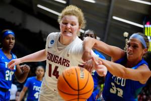 Washington State's Jessica Clarke, center and Florida Gulf Coast's Emma List battle for the ball during the first half of a first-round college basketball game in the NCAA Tournament, Saturday, March 18, 2023, in Villanova, Pa. (AP Photo/Matt Rourke)