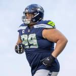 Seattle Seahawks defensive tackle Al Woods (99) enters the field during player introductions before playing against the New York Jets in an NFL football game, Sunday, Jan. 1, 2023, in Seattle, Wash. Seahawks won 23-6. (AP Photo/Jeff Lewis)