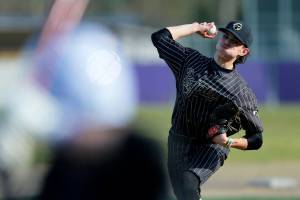 Lynnwood starter Jace Hampson delivers a pitch during a game against Lake Stevens on Friday, March 17, 2023, at Lake Stevens High School in Lake Stevens, Washington. (Ryan Berry / The Herald)