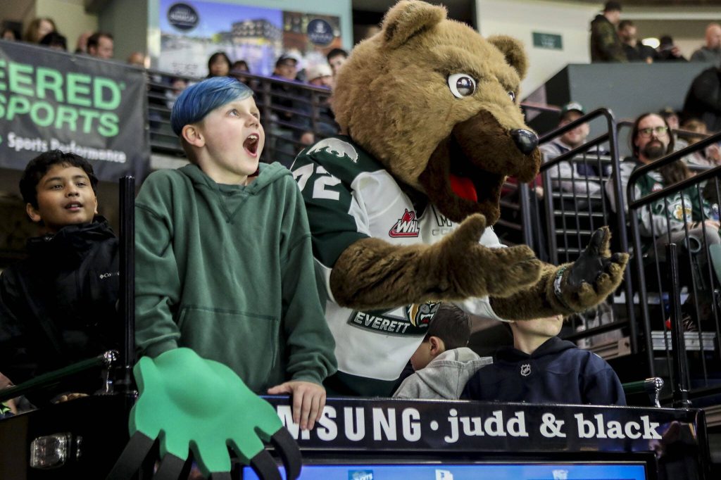 A child prepares to take the ice on a zamboni during a game between the Everett Silvertips and Victoria Royals at the Angel of the Winds Arena on Friday, March 24, 2023. The Silvertips fell to the Royals, 6-4. (Annie Barker / The Herald)