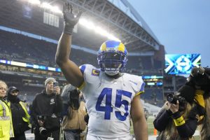 Los Angeles Rams linebacker Bobby Wagner (45) waves to fans after an overtime loss to the Seattle Seahawks during in an NFL football game Sunday, Jan. 8, 2023, in Seattle. (AP Photo/Stephen Brashear)