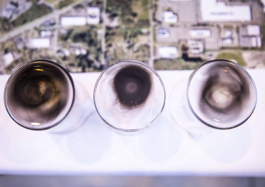 Glass brakes show the soot emissions differences between jet fuels on Tuesday, March 28, 2023 in Everett, Washington. (Olivia Vanni / The Herald)