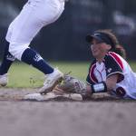 Snohomishs Emma Hansen dives to try and beat the runner to second base during a game against Glacier Peak on March 16, 2022, in Snohomish. (Olivia Vanni / The Herald)