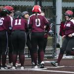 Cascades Alexa Hamshaw is congratulated by her teammates after hitting a home run during a game against Lakewood on March 13, 2023, in Everett. (Olivia Vanni / The Herald)
