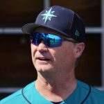 Seattle Mariners manager Scott Servais pauses in the dugout prior to a spring training baseball game against the Milwaukee Brewers, Sunday, March 5, 2023, in Phoenix. (AP Photo/Ross D. Franklin)