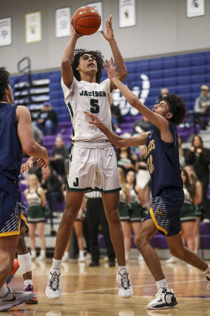 Jackson’s Sylas Williams (5) shoots the ball during a game between Jackson and Mariner at Lake Washington High School in Kirkland, Washington on Thursday, Feb. 16, 2023. After an intense back-and-forth in the final period Mariner defeated Jackson, 77-76. (Annie Barker / The Herald)