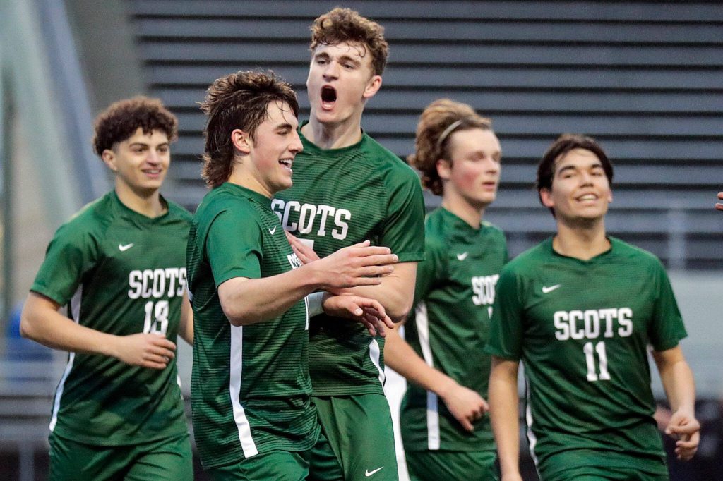 Shorecrest players celebrate a goal against Edmonds-Woodway during a match on May 3, 2022, at Shoreline Stadium. (Kevin Clark / The Herald)
