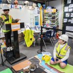 Chenming Guo, left, and Edison Salas present their traffic solution to their class at Hazelwood Elementary School on Wednesday, March 29, 2023, in Lynnwood, Washington. (Olivia Vanni / The Herald)