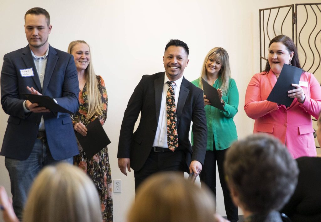 Jonnathan Yepez Carino smiles as he is named one of the top 4 finalists during the Emerging Leader Award presentation on Thursday, April 13, 2023 in Everett, Washington. (Olivia Vanni / The Herald)