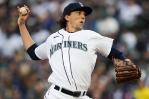 Seattle Mariners starting pitcher Logan Gilbert throws to a Cleveland Guardians batter during the first inning of a baseball game Saturday, April 1, 2023, in Seattle. (AP Photo/Lindsey Wasson)