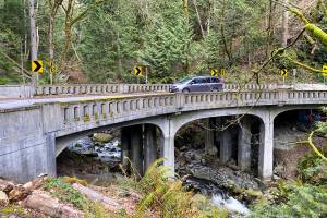 The hairpin curve over Oyster Creek on Chuckanut Scenic Byway in Washington state. The 24-mile road is fun to drive and offers access to trails, shopping, dining and history. Amy Attas/West Coast Traveller photo.