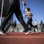 Hurdlers run exercises during a track and field practice after school at Lake Stevens High School in Lake Stevens, Washington on Wednesday, March 22, 2023. The team has over 300 members. (Annie Barker / The Herald)