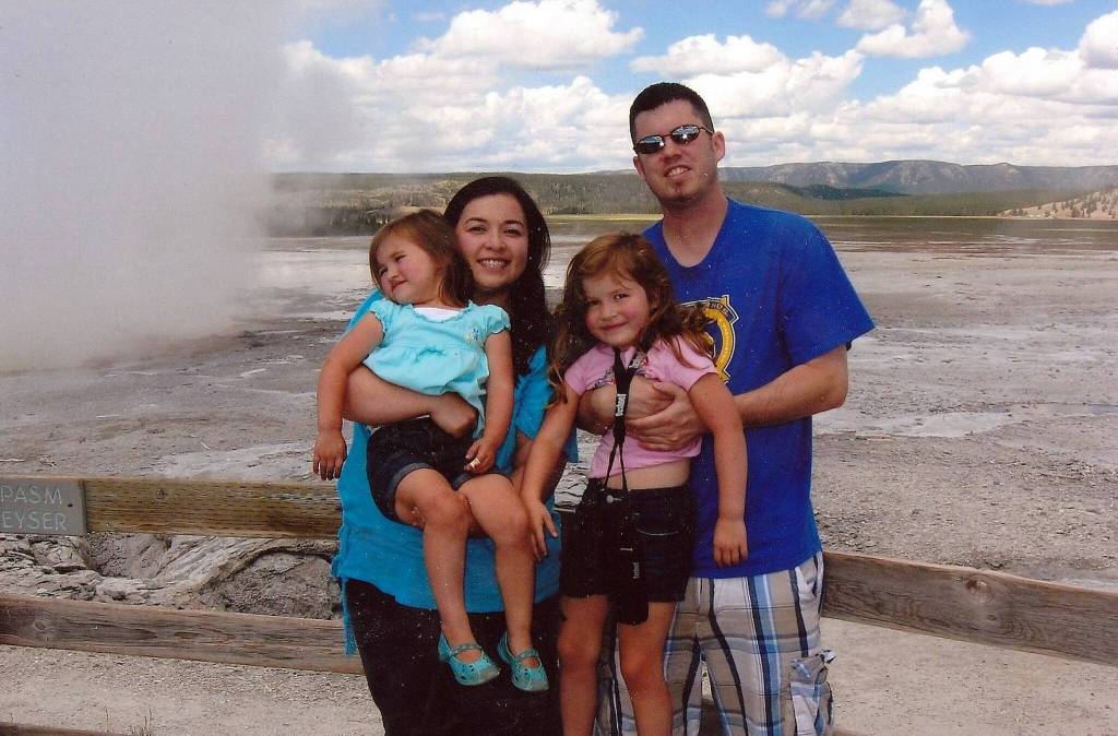 June Oshiro, left, and Jeremy Anderson, right, with their two daughters. (Photo provided)