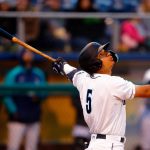 AquaSox shortstop Axel Sanchez pops up a ball during the season opener against the Eugene Emeralds on Friday, April 7, 2023, at Funko Field in Everett, Washington. (Ryan Berry / The Herald)