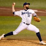 AquaSox reliever Ty Adcock delivers a pitch during the season opener against the Eugene Emeralds on Friday, April 7, 2023, at Funko Field in Everett, Washington. (Ryan Berry / The Herald)