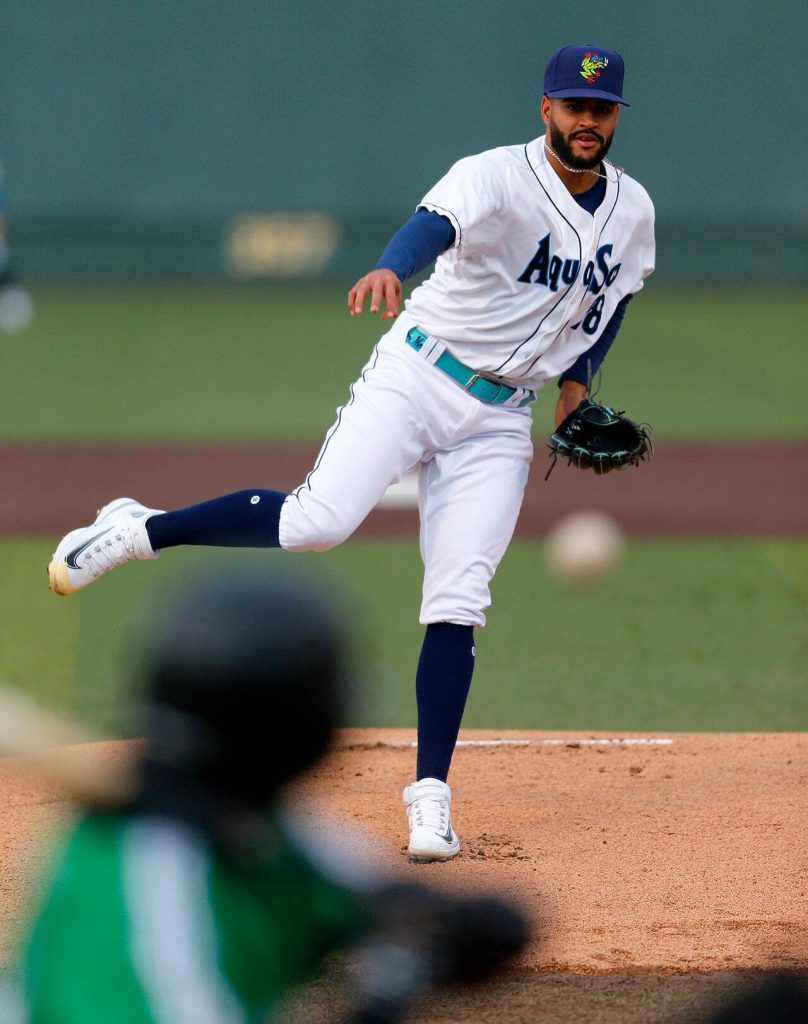 AquaSox starter Juan Mercedes delivers a pitch during the season opener against the Eugene Emeralds on Friday at Funko Field in Everett. (Ryan Berry / The Herald)