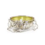 Three-dimensional silver figures of animals and wildlife are often seen on elaborate silver pieces. This bowl takes a slightly different approach, with figures of sea animals attached to a wire net.