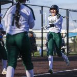 Macie Dean runs into home to score a run during the game against Kamiak on Tuesday, April 11, 2023 in Everett, Washington. (Olivia Vanni / The Herald)