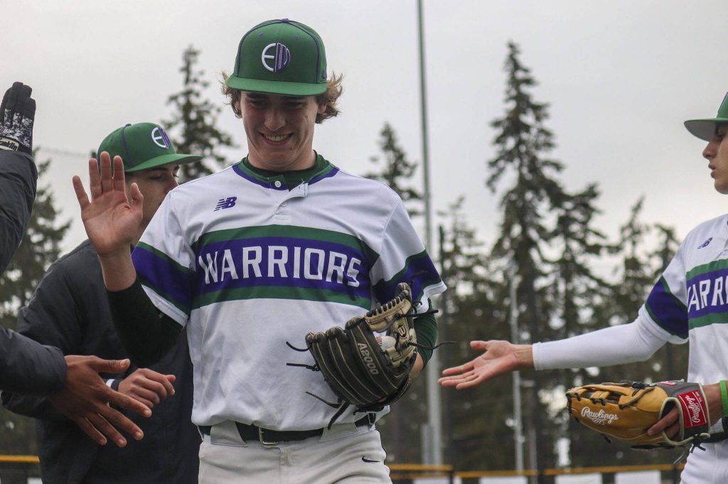 Warrior players celebrate during a baseball game between Edmonds-Woodway and Mountlake Terrace at Edmonds-Woodway High School in Edmonds, Washington on Thursday, April 13, 2023. The Warriors won, 5-1. (Annie Barker / The Herald)