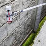A volunteer dumps out a can during Litter League pick up on Tuesday, April 18, 2023, in Marysville, Washington. (Olivia Vanni / The Herald)