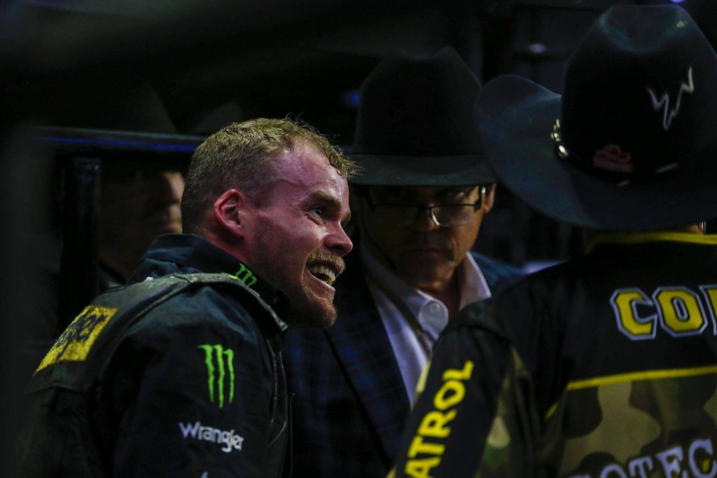 Boudreaux Campbell reacts after riding a bull during Unleash The Beast at Angel of the Winds Arena in Everett, Washington on Thursday, April 20, 2023. (Annie Barker / The Herald)